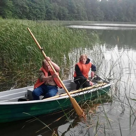 At The With A Boat Spychowo